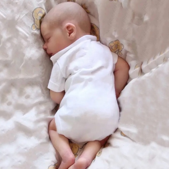 Realistic Baby Doll in White Outfit - Picture 2 of 4
